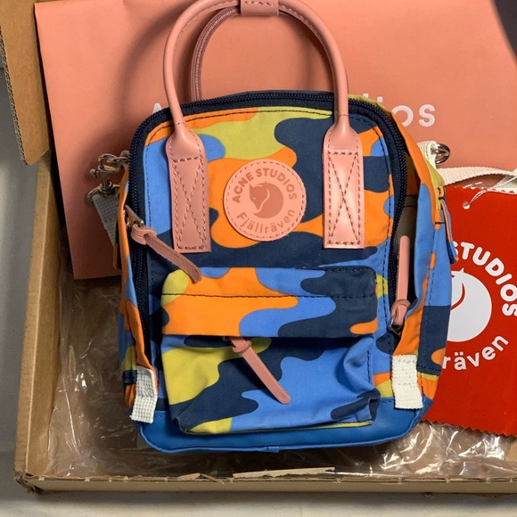 Acne Studios Handbags - Acne Kanken Clutch micro backpack